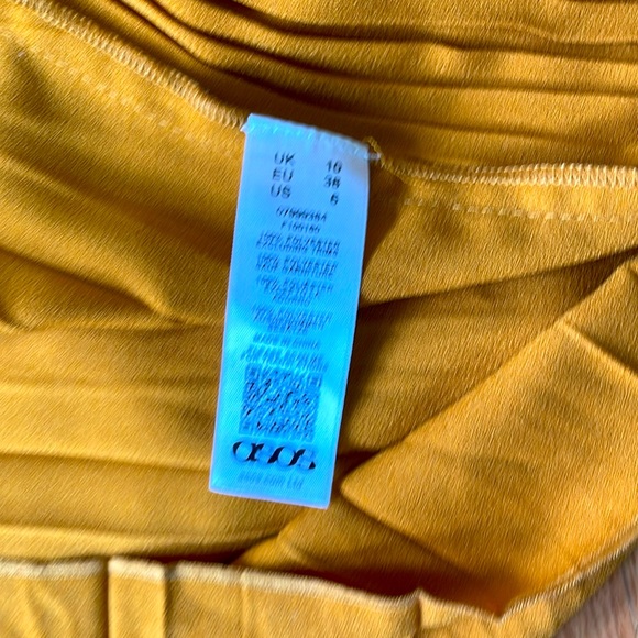 Wrap up asymmetrical pleated skirt - Picture 8 of 8